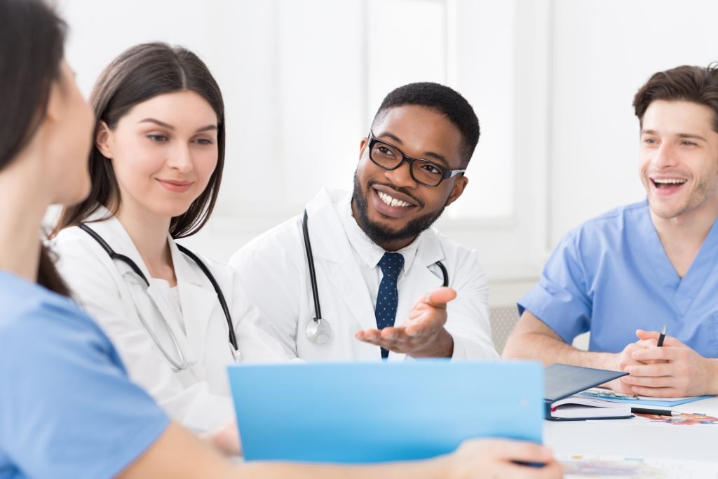 Express Fast Quick Certification Training Program in Healthcare, Medical staff having discussion in hospital, meeting of interns, nurses, doctors, studying for certification exam